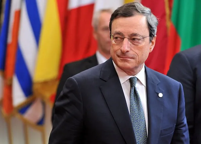 European Central Bank President Mario Draghi leaves after talks gathering heads of state or government during a European Union summit at the EU headquarters, last Friday in Brussels. (GEORGES GOBET/AFP/Getty Images)