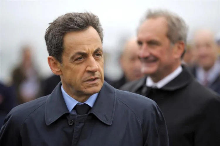 French President Nicolas Sarkozy is seen at the Lanveoc-Poulmic naval airbase in Lanveoc, France, on January 3. In a speech at the airbase Sarkozy called on Syrian President Bashar al-Assad to step down. (Philippe Wojazer/AFP/Getty Images)