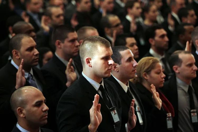 New York City Police Department recruits are sworn in by Mayor Michael Bloomberg during a ceremony on January 10, in New York City. A total of 898 new recruits participated in the ceremony which will see them head to the police academy for approximately 6 months of training. (Spencer Platt/Getty Images)