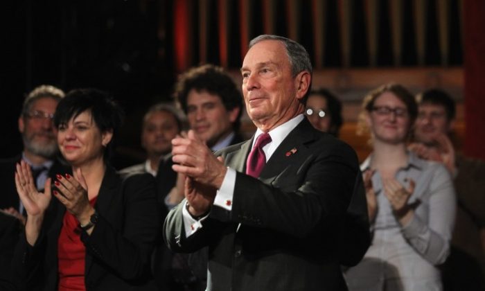 Mayor Michael Bloomberg applauds after delivering his annual State of the City address at Morris High School Campus on Jan. 12, in the Bronx borough of New York City. (Mario Tama/Getty Images)