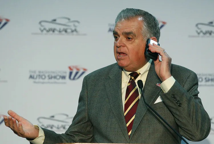 Transportation Secretary Ray LaHood holds up his BlackBerry, while speaking about the dangers of using it while driving, at the Washington Auto Show January 26. (Mark Wilson/Getty Images)