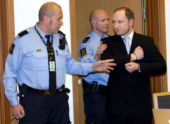 Right-wing extremist Anders Behring Breivik, (R) arrives in court in Oslo on February 6, 2012. (Daniel Sannum Lauten/AFP/Getty Images)