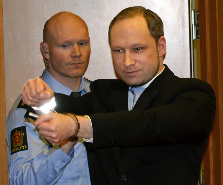 Anders Behring Breivik, (R) arrives in court in Oslo on Feb. 6. (Daniel Sannum Lauten/AFP/Getty Images)