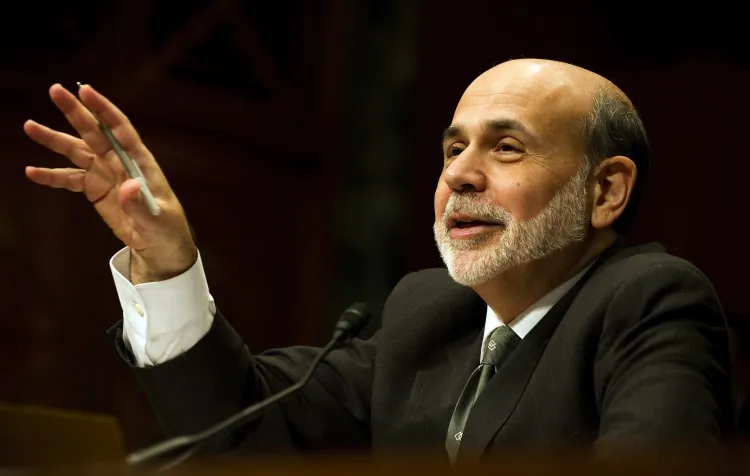 Federal Reserve Board chairman Ben Bernanke testifies before the U.S. Senate Budget Committee on ‘The Outlook for U.S. Monetary and Fiscal Policy’ on Capitol Hill in Washington, D.C., Feb. 7. U.S. stocks opened lower Tuesday as traders awaited fresh testimony from Federal Reserve chief Ben Bernanke to Congress on the economy and watched fraught efforts to resolve the Greek debt crisis.(Jim Watson/AFP/Getty Images)