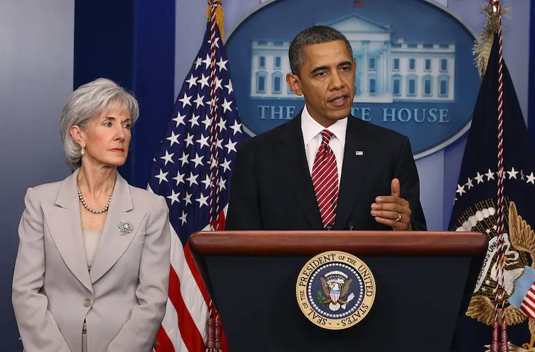 President Barack Obama is joined by Health and Human Services Secretary Kathleen Sebelius while making a statement in the briefing room at the White House on Feb. 10. Obama announced a reversal of his administration's health care rule requiring religious employers to provide women free access to contraception. (Mark Wilson/Getty Images)