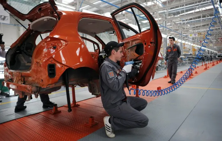 Employees work on the assembly line of the new Great Wall Motors car plant in the village of Bahovitsa on Feb. 21. China's Great Wall Motors eyes to enter the European market with cars assembled in Bulgaria. (Nikolay Doychinov/AFP/Getty Images)
