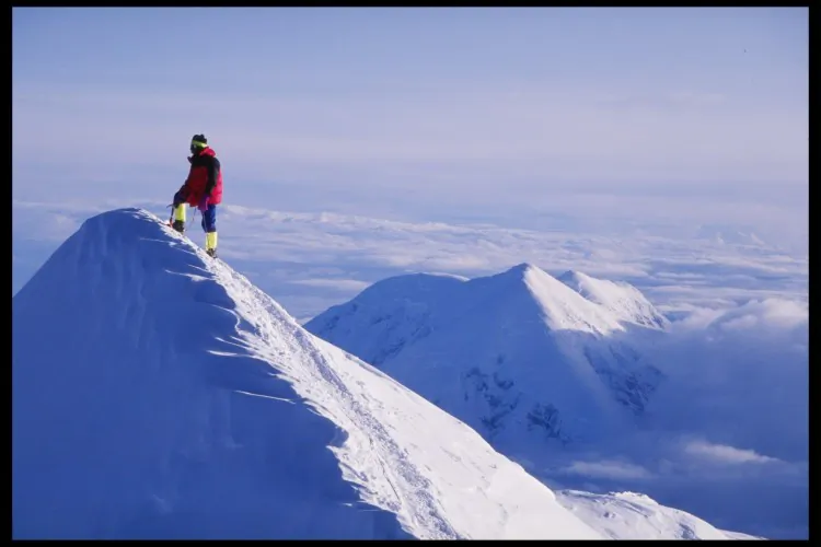 A lone climber stands on the Summit Ridge at Denali on Mount McKinley, Alaska. (Mike Powell/Getty Images)