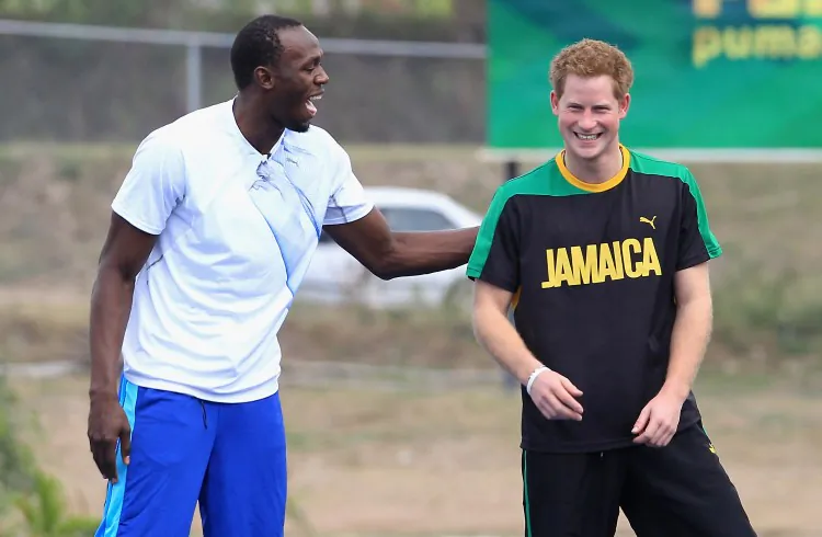 Prince Harry races Usain Bolt at the Usain Bolt Track at the University of the West Indies on March 6, 2012 in Kingston, Jamaica. (Chris Jackson/Getty Images)