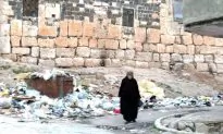 Syria Launches Attacks on Two Cities, Activists Say