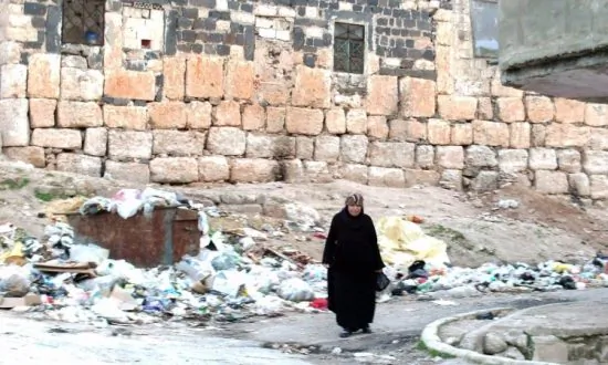 Syria Launches Attacks on Two Cities, Activists Say