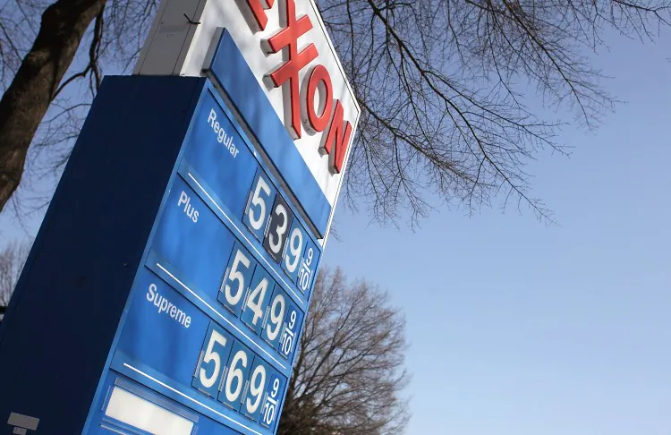 Gas prices have climbed past $5 a gallon in some U.S. cities. Critics blame Obama Administration energy policies for the rising price at the pump, but the President says many of the factors contributing to fuel costs are outside the government's control. (Mark Wilson/Getty Images)