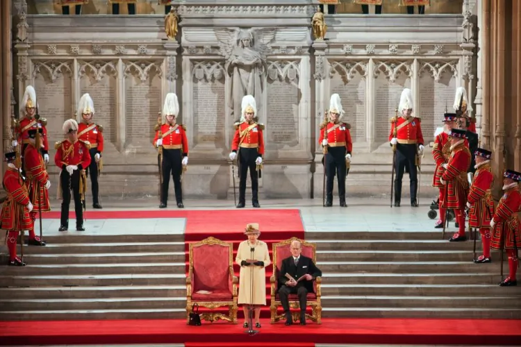 Queen Elizabeth II addresses both Houses of Parliament as Prince Philip, Duke of Edinburgh looks on, in Westminster Hall on March 20, 2012 in London, England. (Jack Hill - WPA Pool /Getty Images)