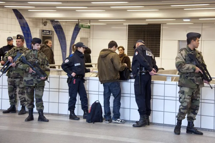 Soldiers and policemen check a passenger in the subway, one day after the shooting of the 'Ozar Hatorah' Jewish school, on March 20, 2012 in Toulouse, southwestern France. (Pascal Pavani/AFP/Getty Images)