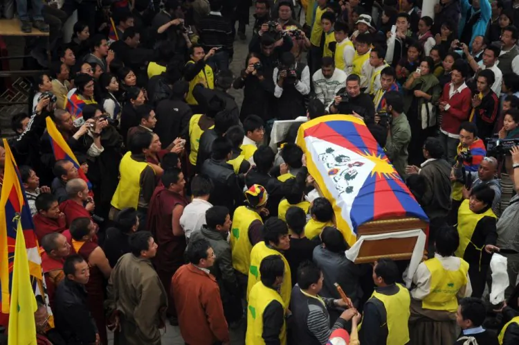 The coffin of Jamphel Yeshi, who died after self-immolation on March 28 in New Delhi, is carried for cremation after a ceremony at Tsuglakhang Temple in McLeod Ganj on March 30, 2012. More than 30 Tibetans have set themselves on fire since March 2011. (Lobsang Wangyal/AFP/Getty Images)
