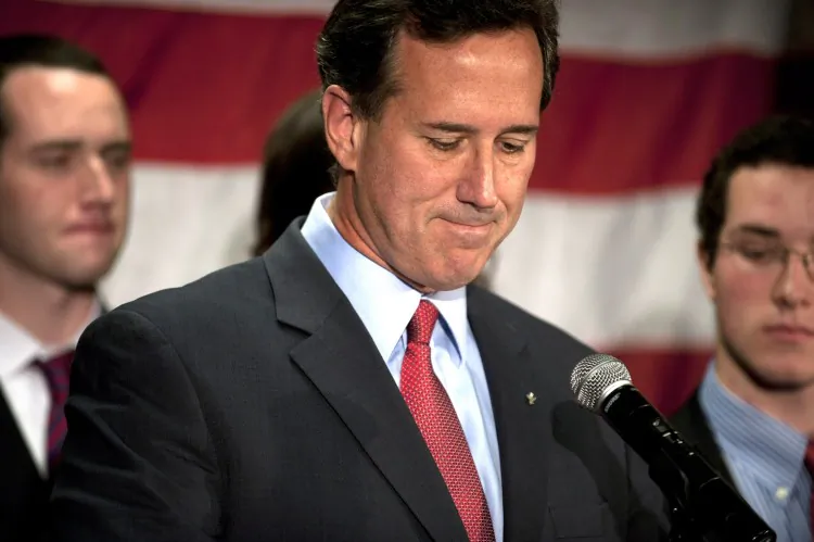 Surrounded by members of his family, Republican presidential candidate, former Sen. Rick Santorum announces he will be suspending his campaign during a press conference at the Gettysburg Hotel on April 10 in Gettysburg, Pa. (Jeff Swensen/Getty Images)