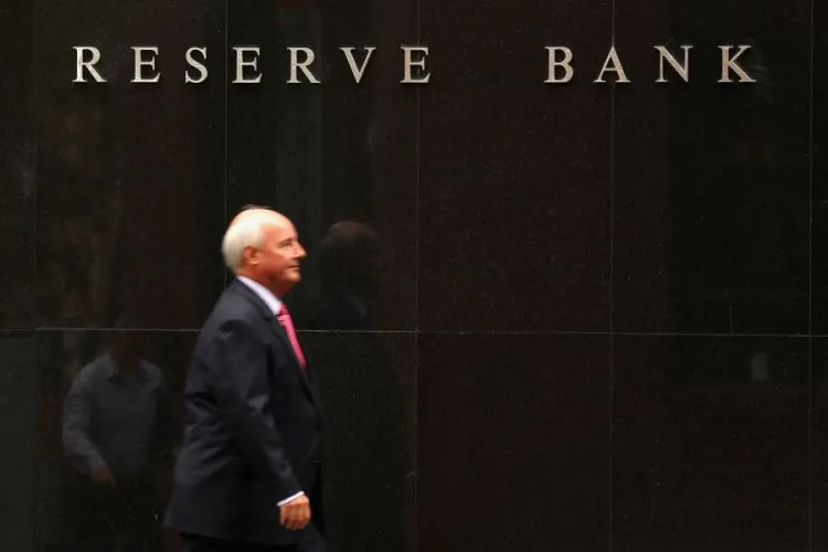 A man walks past the Reserve bank in Sydney, Australia. (Cameron Spencer/Getty Images)