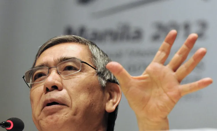 Haruhiko Kuroda, rumored to become the next head of the Bank of Japan speaks during a press conference in 2012. Kuroda is the head of the Asian Development Bank and a former Japan finance ministry offical. He is likely to be confirmed by Prime Minister Shinzo Abe this week. (Ted Aljibe/AFP/GettyImages)