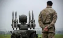 Residents Protest Against Olympic Missiles on Roof