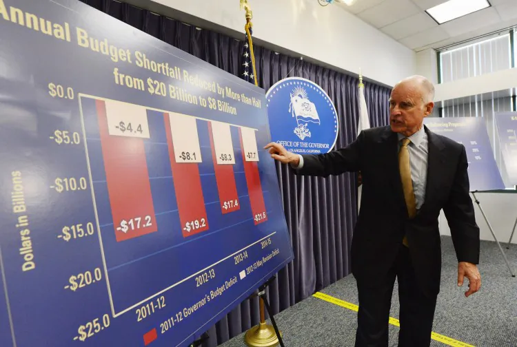 California Gov. Jerry Brown speaks during a news conference about the state budget on May 14 in Los Angeles, Calif. Brown proposes $8.3 billion in cuts to help close a projected $16 billion budget shortfall. (Kevork Djansezian/Getty Images)