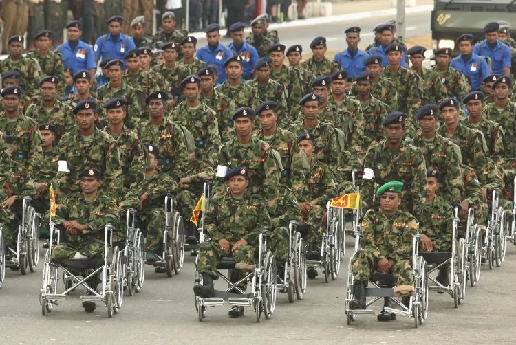 A Sri Lankan amputee runs at an athletic event for disabled soldiers in Colombo on September 23, 2010. (Ishara S. Kodikara/AFP/Getty Images)
