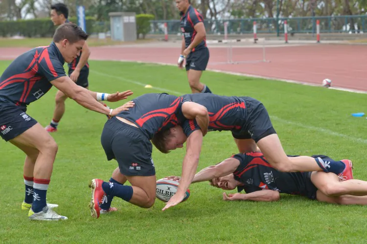 Hong Kong Sevens team during a training drill on Monday March 18 as they prepare for the Cathay Pacific/HSBC Hong Kong Sevens. (Bill Cox/The Epoch Times)