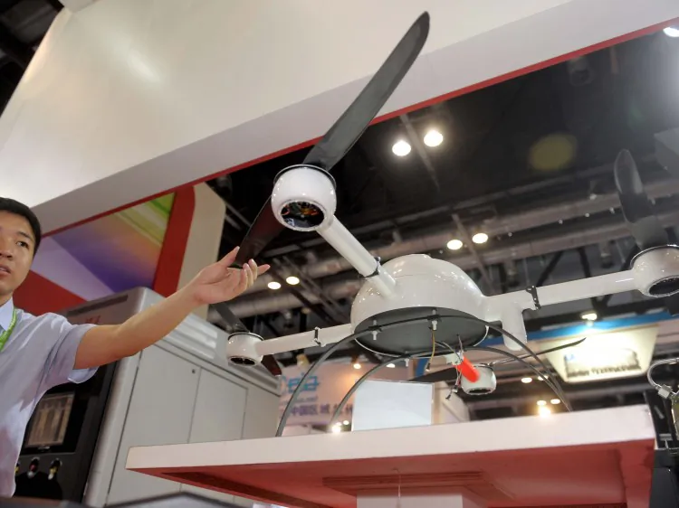 In this photo, taken on May 22, 2012, a surveillance drone is displayed in Beijing. The drones that China plans to deploy are small, propeller aircraft that can take off from ships. (STR/AFP/Getty Images)