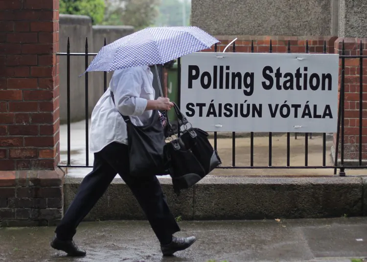 A voter arrives at a polling station to vote in the referendum on the European fiscal treaty in Dublin, Ireland on May 31, 2012. Ireland is the only one of 25 nations which is putting the fiscal pact to a national vote. The pact, signed by all EU members except the Czech Republic and the UK, allows EU member states to co-ordinate their budget policies and impose penalties on rule-breakers. (PETER MUHLY/AFP/GettyImages)