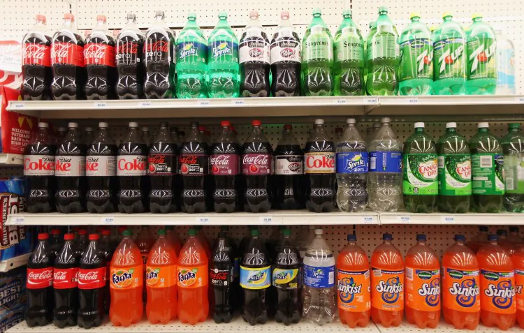 Two-liter bottles of regular and diet soda are seen for sale at a Manhattan store on May 31, in New York City. New York City Mayor Michael Bloomberg is proposing a ban on sodas and sugary drinks that are more than 16 ounces in an effort to combat obesity. Diet sodas would not be covered by the ban and many grocery stores would be exempt. (Mario Tama/Getty Images)
