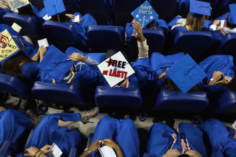High school graduates listen to a commencement speech from Vice President Joe Biden when the presidential campaign was underway in June 2012. According to new data from the U.S. Department of Education, none of the states have a high school graduation rate above 90 percent. The average graduation rate was 70 percent in the 2010-2011 school year. (Getty Images/Joe Raedle)