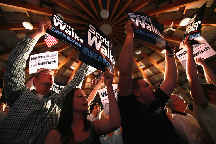 Supporters of Wisconsin Gov. Scott Walker cheer as they watch returns at an election-night rally June 5, in Waukesha, Wis. (Scott Olson/Getty Images)