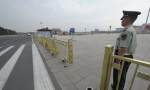 Deceased Democracy Activist's Relatives in China Under Police Surveillance