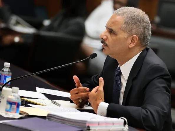 Attorney General Eric Holder testifies during a House Judiciary Committee hearing on Capitol Hill, June 7. Holder says he has given congressional investigators the necessary information. (Mark Wilson/Getty Images)