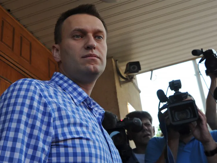 Russian anti-corruption blogger Alexei Navalny stands a the entrance to a Federal Investigative Commission office in Moscow, on June 12, 2012. (Andrey Smirnov/AFP/Getty Images)