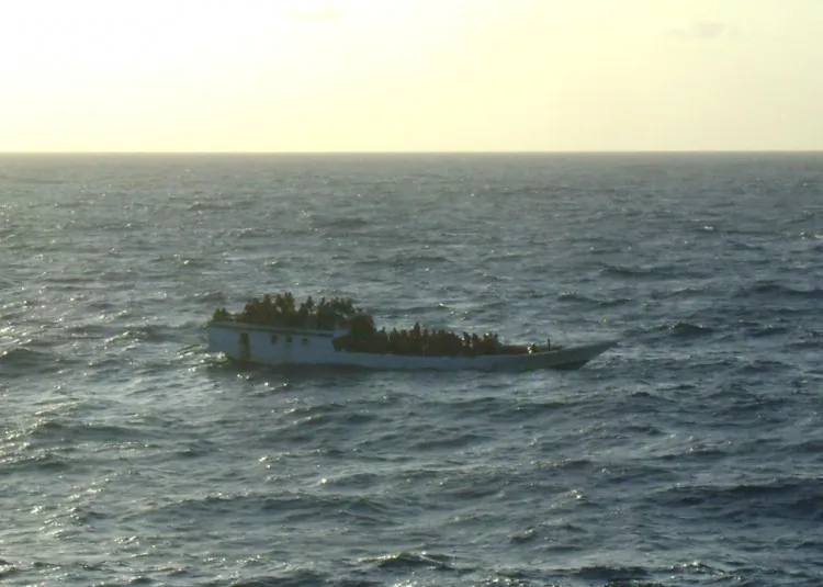 In this handout photo provided by Australian Maritime Safety Authority, a boat carrying 150 suspected asylum seekers is spotted by crew onboard MV Bison, prior to the vessel sinking, 107 nautical miles north of Christmas Island, on June 27. (MV Bison/Australian Maritime Safety Authority via Getty Images)