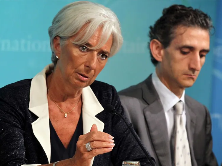 IMF Managing Director Christine Lagarde (L) speaks as U.S. Mission Chief Gian Maria Milesi-Ferretti (R) listens during a news conference on July 3 at the IMF headquarters in Washington. IMF is concerned over Spain's banking sector and its autonomous regions, which are in critical financial condition. (Alex Wong/Getty Images)