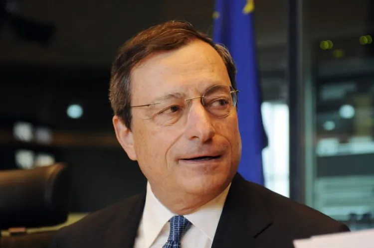 European Central Bank President Mario Draghi speaks during a regular monetary dialogue at the European Parliament in Brussels, July 9. Thursday, Draghi’s reassuring comments in support of the euro sent stock markets soaring. (Thierry Charlier/AFP/GettyImages)