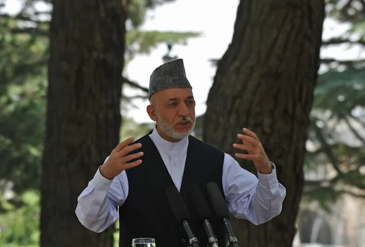Afghanistan president Hamid Karzai speaks during a press conference at the presidential palace in Kabul on July 12, 2012. (Massoud Hossaini/AFP/Getty Images)