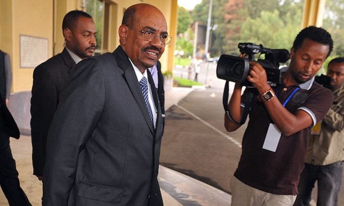 Sudanese President Omar Al-Bashir leaves on July 14, 2012 the venue following the opening session of the Peace and Security council meeting at the African Union in Addis Ababa, Ethiopia. (Simon Maina/AFP/GettyImages)