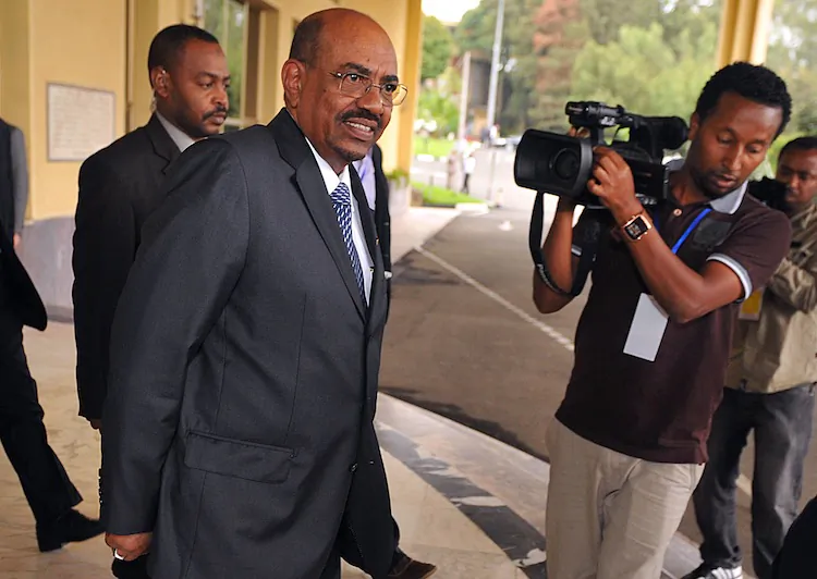 Sudanese President Omar Al-Bashir leaves on July 14, 2012 the venue following the opening session of the Peace and Security council meeting at the African Union in Addis Ababa, Ethiopia. (Simon Maina/AFP/GettyImages)