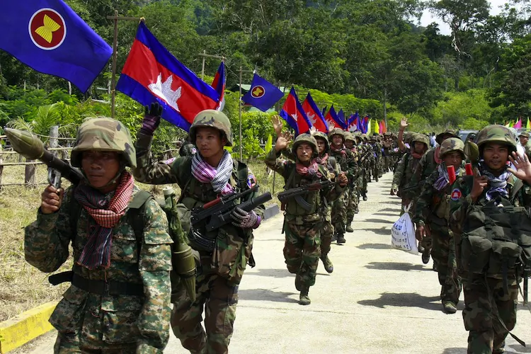 Cambodian soldiers take part in a ceremony to withdraw from an area disputed with Thailand near the Preah Vihear temple in Preah Vihear province, some 500 kms northwest of Phnom Penh on July 18, 2012. (Khem Sovannara/AFP/Getty Images)