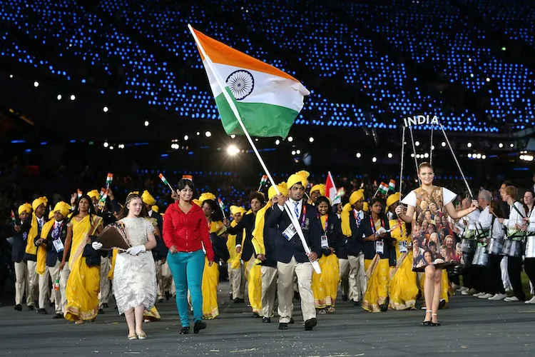 India was furious over a mystery woman wearing red and blue who was walking alongside the country’s Olympic contingent during the opening ceremony at the Olympic Stadium on July 27, 2012 in London, England. (Cameron Spencer/Getty Images)