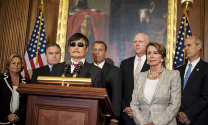 Chinese human rights activist Chen Guangcheng speaks to the press in Washington, D.C., after meeting with Speaker of the House John Boehner and House Minority Leader Nancy Pelosi. (Pete Marovich/Getty Images)