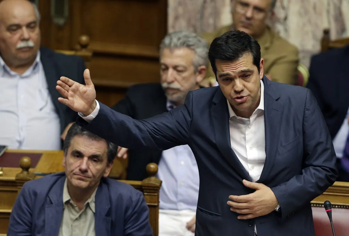 Greece's Prime Minister Alexis Tsipras delivers a speech during a parliament meeting in Athens, Thursday, July 16, 2015. (AP Photo/Thanassis Stavrakis)