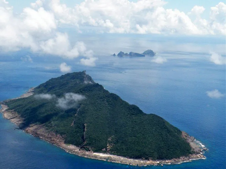 This aerial shot taken on Sept.15, 2010 shows the disputed islands known as Senkaku in Japan and Diaoyu in China. Subtle shifts have taken place between China and Japan in the dispute over rocky islands in the sea recently, though disputes continue to rage. (Jiji Press/AFP/Getty Images)