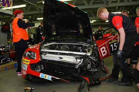 The crew of the #151 Perfection Racing Europe Aston Martin Vantage V8 GT4 struggles to get it back on track. (24hDubai.com)
