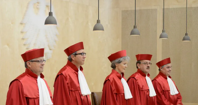 The judges of Germany's Constitutional Court arrive to give their verdict on Germany's ratification of the European Stability Mechanism (ESM) on Sept. 12, in Karlsruhe, Germany. (Matthias Hangst/Getty Images)