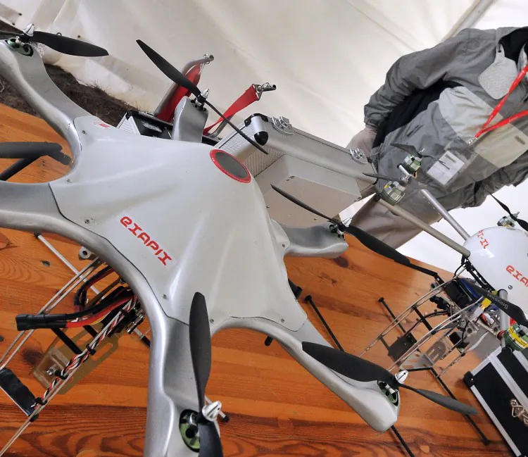 Multi-rotor ExaPix drones are displayed on a table on Sept. 26, in Merignac, France, during the UAV Show Europe, an international drone fair. (Pierre Andrieu/AFP/Getty Images)