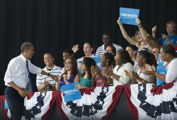President Barack Obama greets supporters before speaking during a campaign event at Farm Bureau Live in Virginia Beach, Virginia, September 27, 2012. President Barack Obama and his Republican challenger Mitt Romney were both in Virginia on Thursday. (Saul Loeb/AFP/GettyImages)