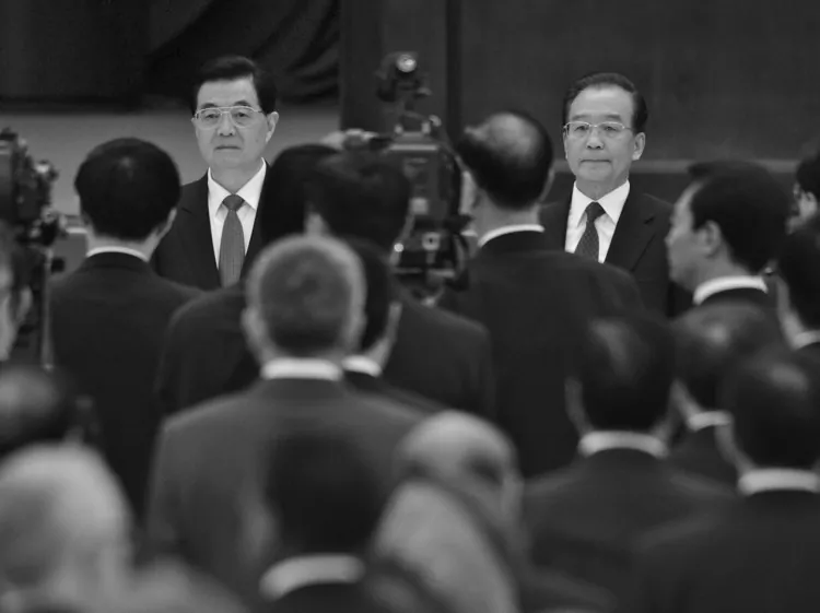 Hu Jintao (L) and Premier Wen Jiabao (R) at the Great Hall of the People in Beijing on Sept. 29, 2012. On Oct. 6 and 7, Chinese Premier Wen Jiabao visited Bijie City in Guizhou Province. (Ed Jones/AFP/Getty Images)