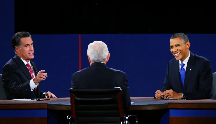 U.S. President Barack Obama (R) debates with Republican presidential candidate Mitt Romney as moderator Bob Schieffer (C) of CBS looks on at the Keith C. and Elaine Johnson Wold Performing Arts Center at Lynn University on Oct. 22, 2012, in Boca Raton, Fla. The focus for the final presidential debate before Election Day on Nov. 6 was foreign policy. (Joe Raedle/Getty Images)